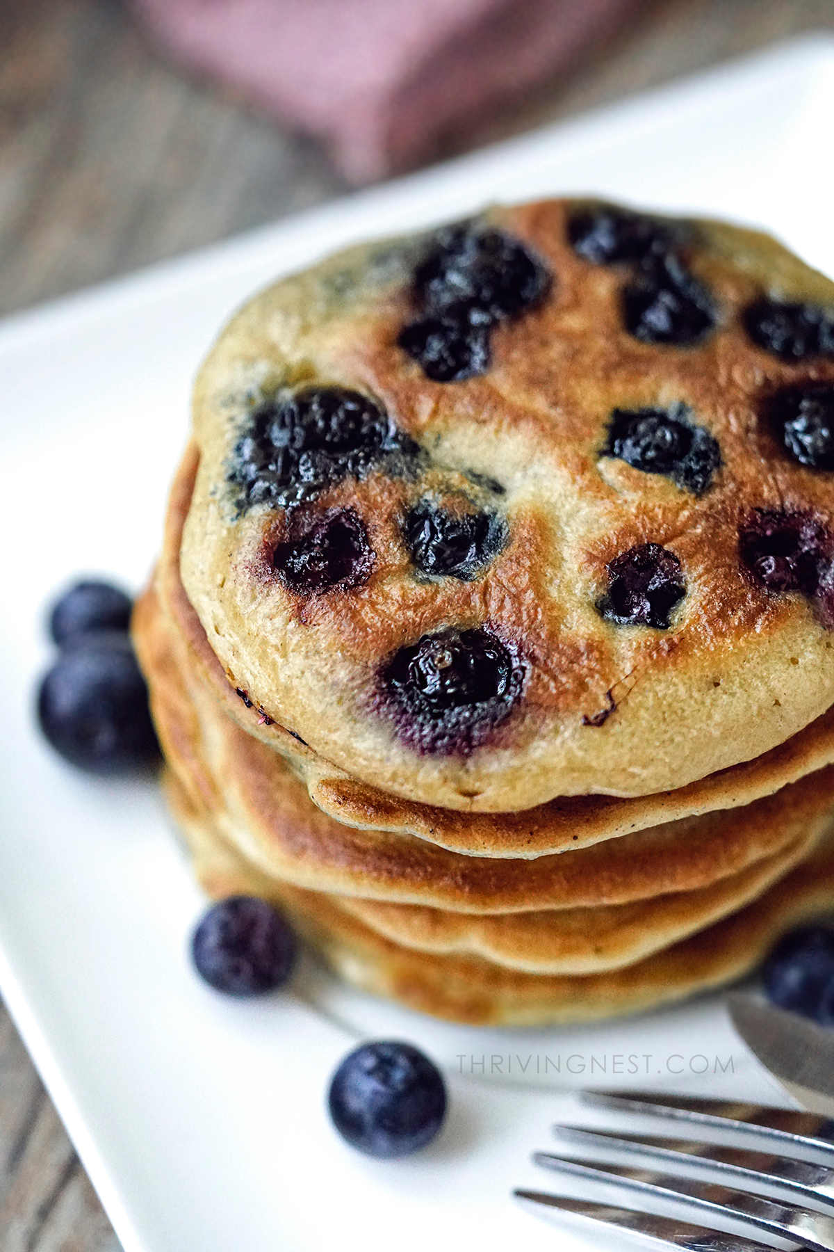 Close up shot of small blueberry pancakes for babies and toddlers.