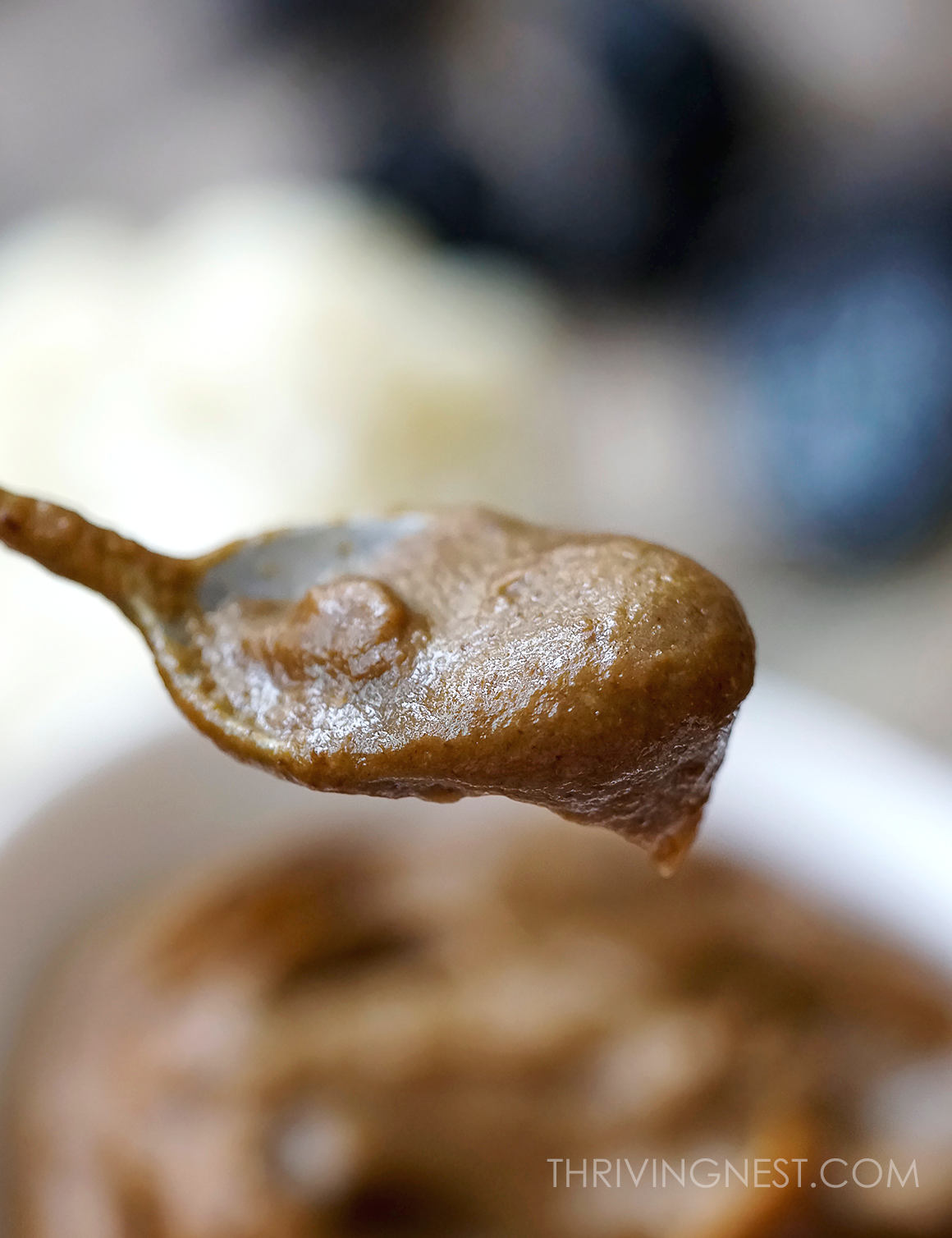 Cauliflower prune and avocado puree smoothly blended in a spoon.