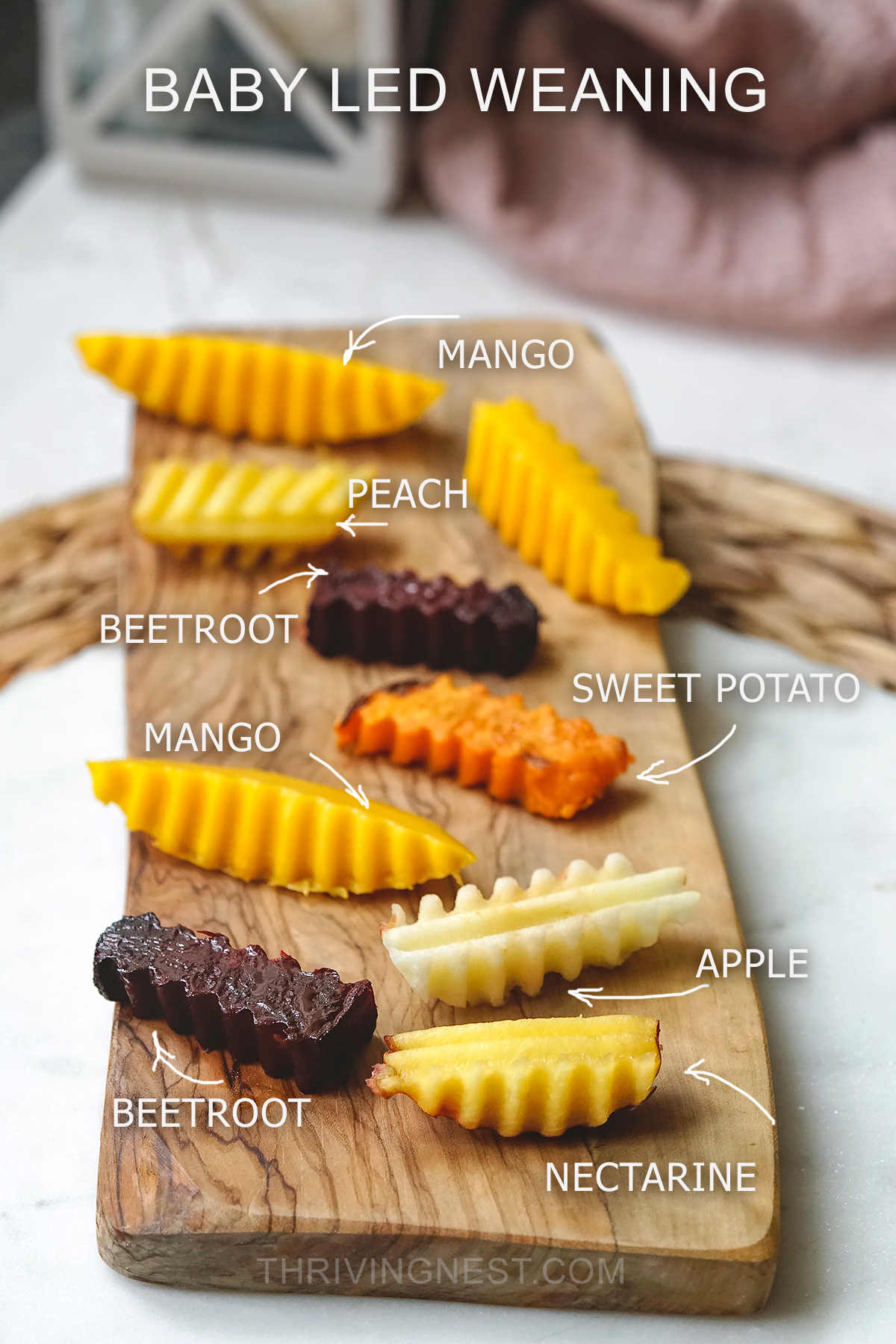 Examples of baby led weaning first foods: sweet potato, mango, peach, apple, nectarine cut into wedges or strips with a crinkle cutter.