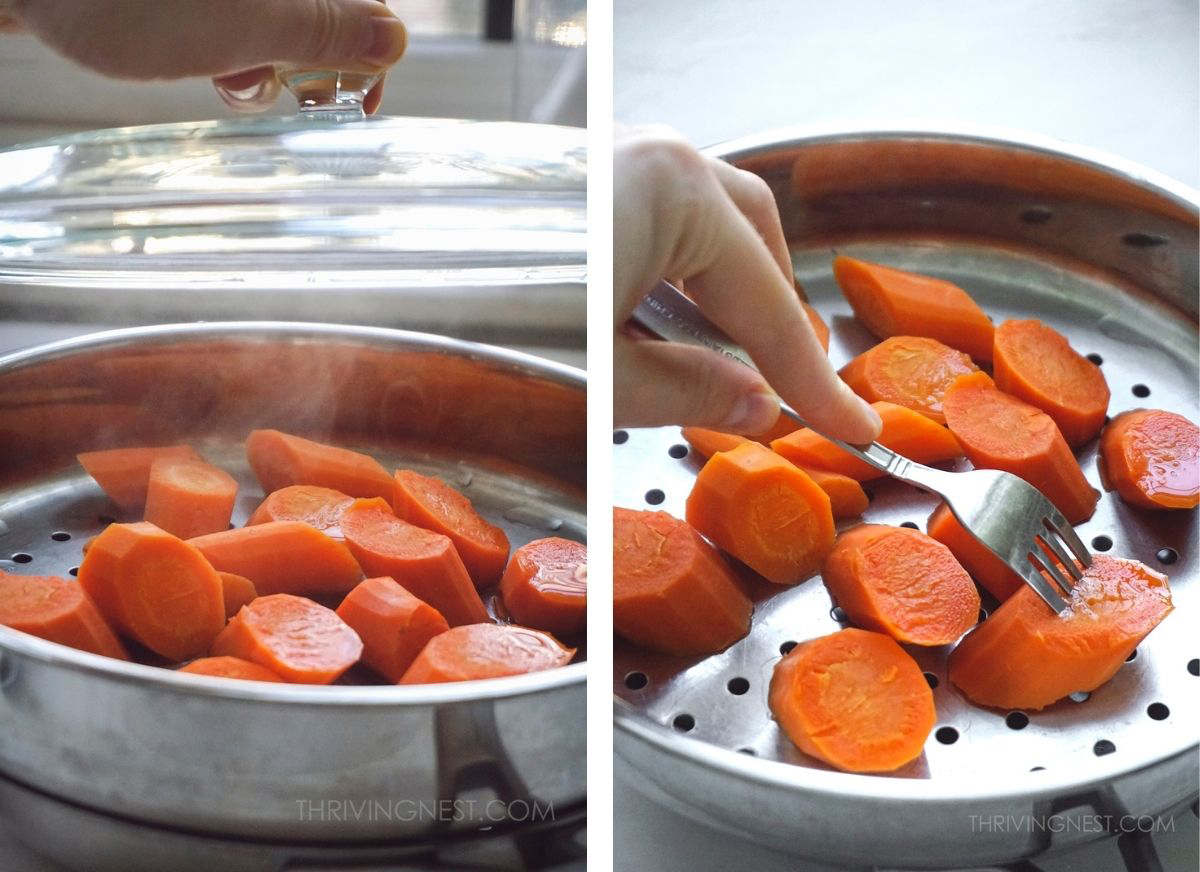 Steaming carrots for baby, checking the softness after steaming.