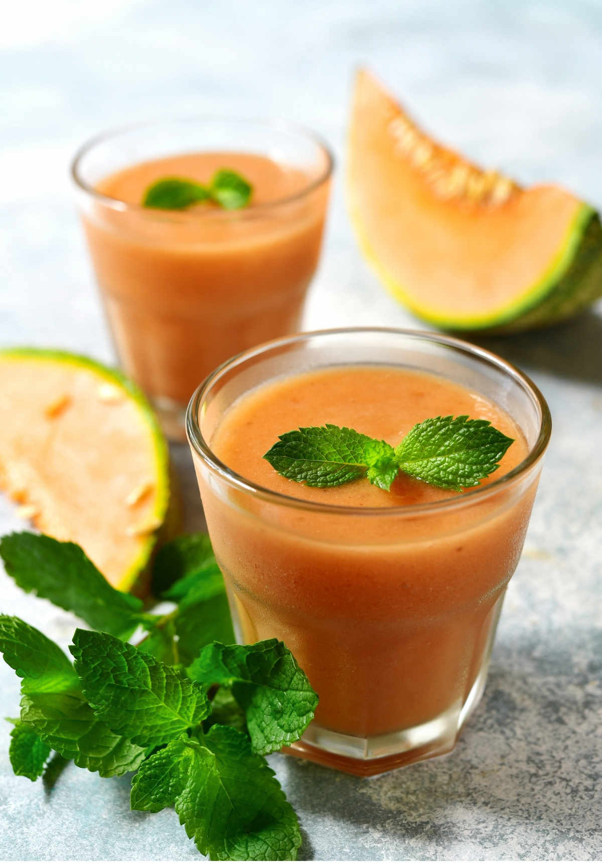 Cantaloupe smoothie with mint leaves for toddlers.