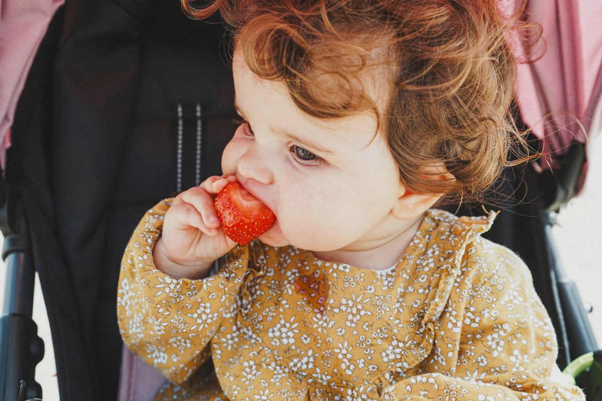 baby led weaning strawberries baby eating strawberry
