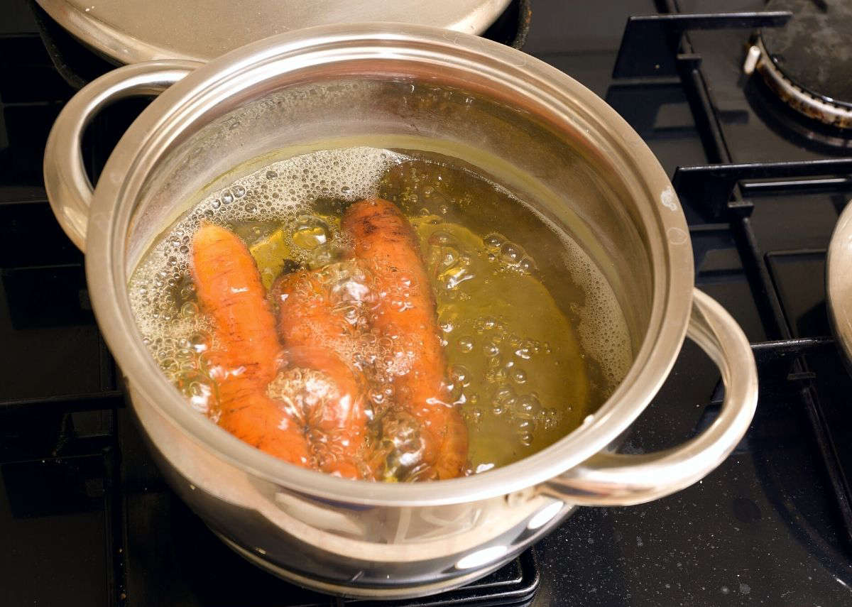 Boiling carrots for baby led weaning.