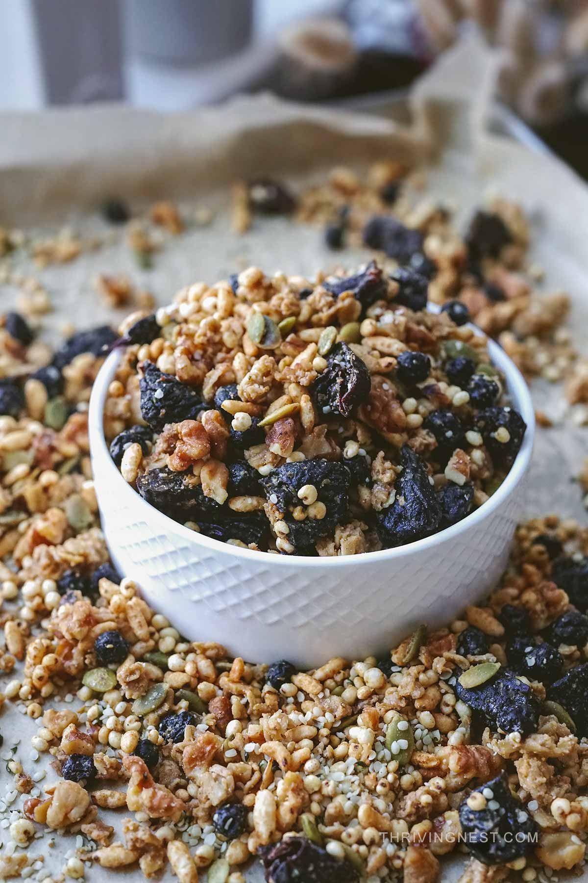 Homemade kid friendly granola, made with puffed grains appealing for toddlers too, presented in a bowl.