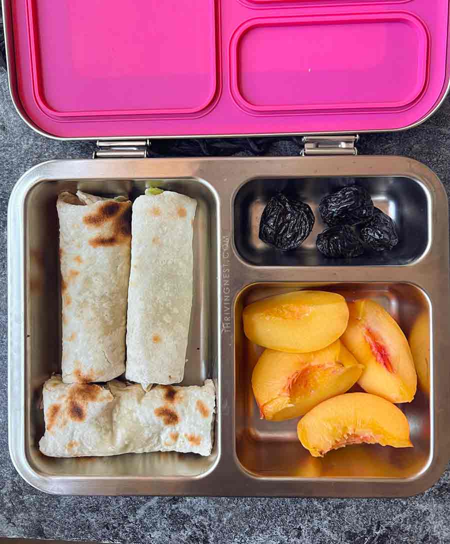 guacamole wraps peaches and dried plums in kids lunchbox